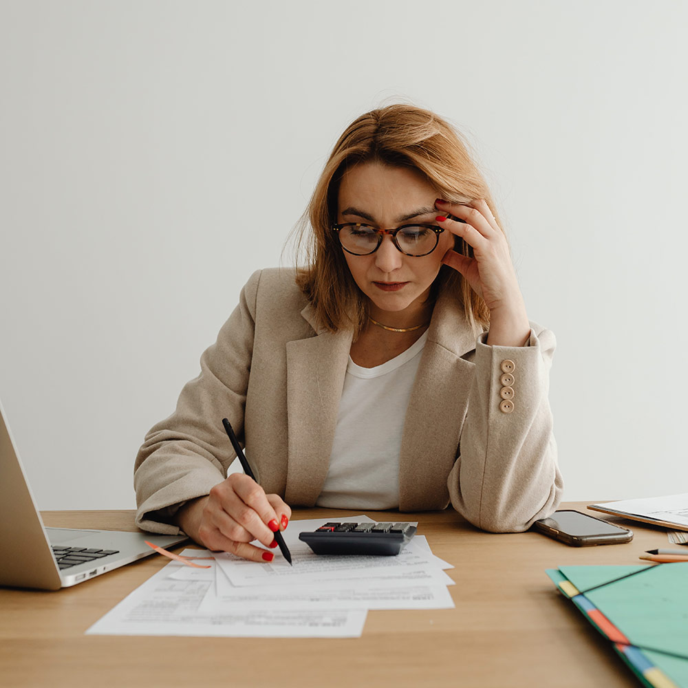 Image of female frustrated business owner.