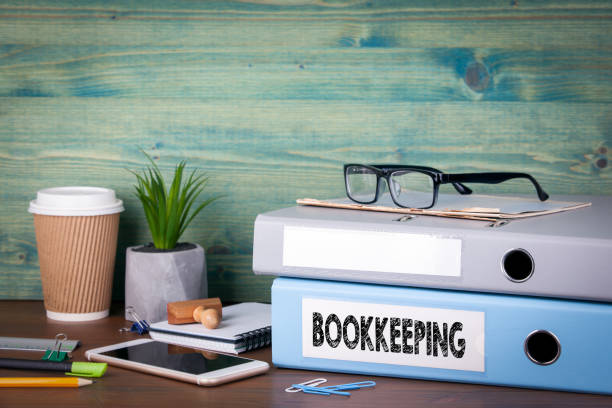 mage of books for a bookkeeper on a desk.